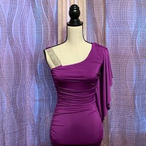 Purple form fitting cocktail dress